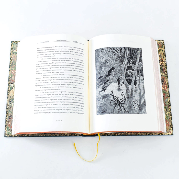 The leather-bound book "Wild Swans and other fairy tales" by G. H. Andersen