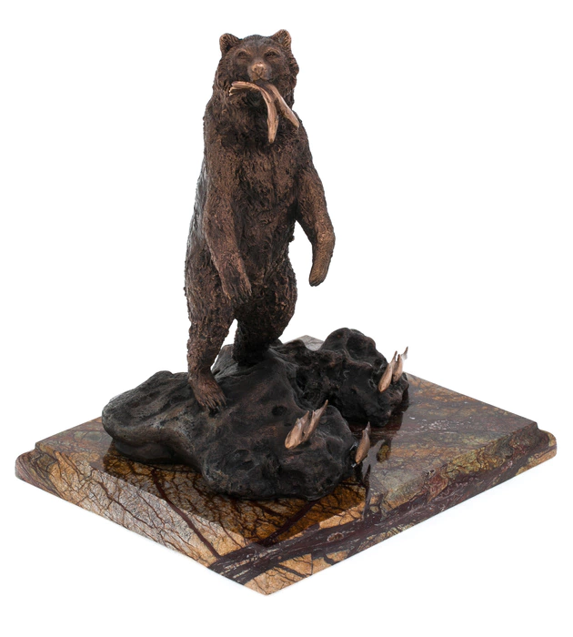 The author's bronze sculpture "Bear with fish"