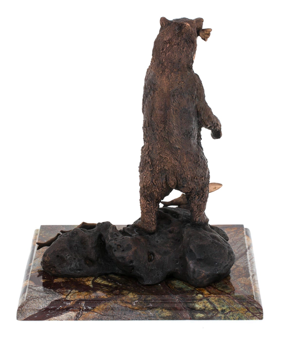 The author's bronze sculpture "Bear with fish"