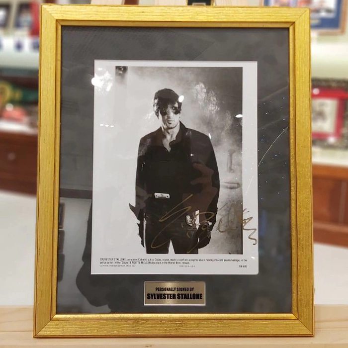 An autographed photo of actor Sylvester Stallone