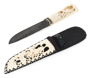 The knife "Traveler - Stone Age" (carved handle and scabbard)
