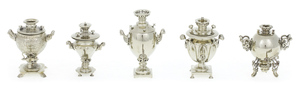A set of mini samovars made of nickel silver in a wooden box