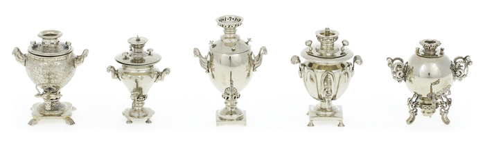 A set of mini samovars made of nickel silver in a wooden box