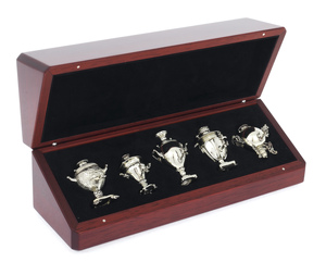 A set of mini samovars made of nickel silver in a wooden box