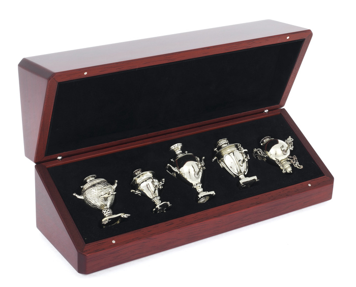 A set of mini samovars made of nickel silver in a wooden box