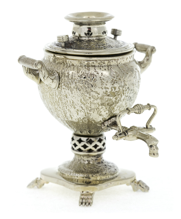 A set of mini samovars made of nickel silver in a wooden box