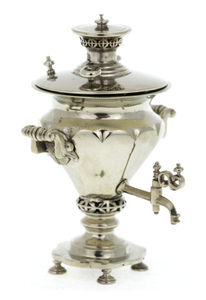 A set of mini samovars made of nickel silver in a wooden box