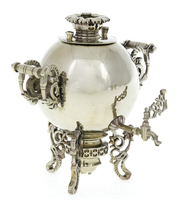 A set of mini samovars made of nickel silver in a wooden box