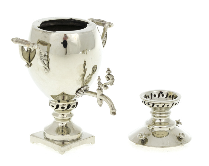 A set of mini samovars made of nickel silver in a wooden box