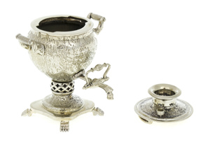 A set of mini samovars made of nickel silver in a wooden box