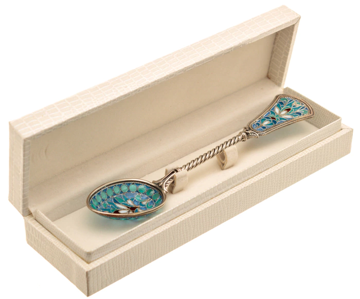 A teaspoon of "The Seasons. Winter" with stained glass enamels