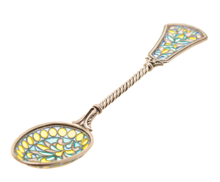 A teaspoon of "The Seasons. Spring" with stained glass enamels