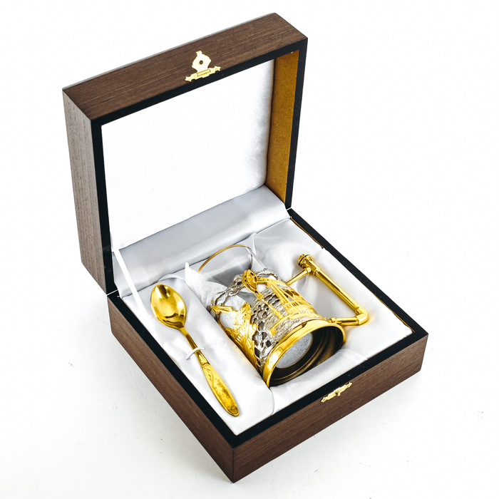 Cup holder "Oil production" with a spoon in a case