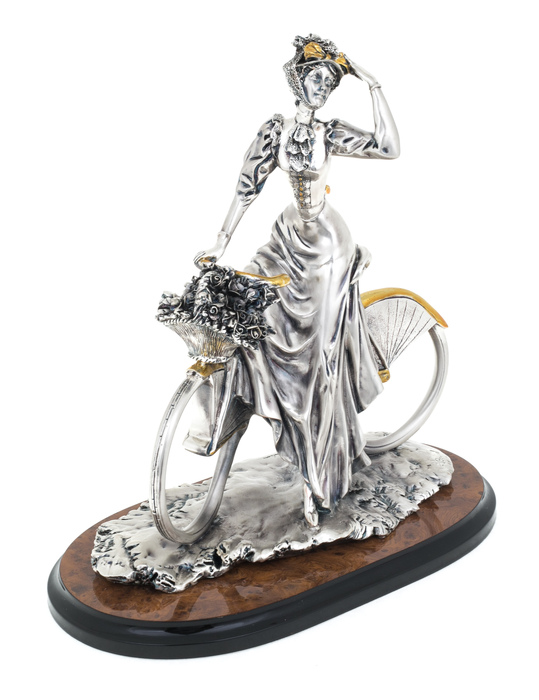 Statuette "Lady on a bicycle" with silver and gilding