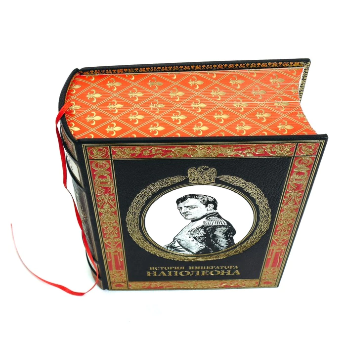 The leather-bound book "The History of the Emperor Napoleon"
