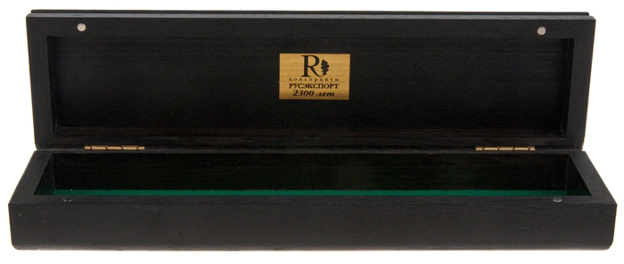 A pencil case made of stained oak