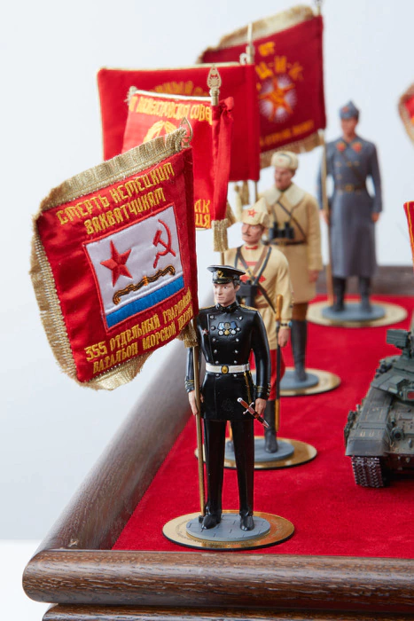 A book in a box with models of equipment and figures of military personnel "100 years of the Red Army"