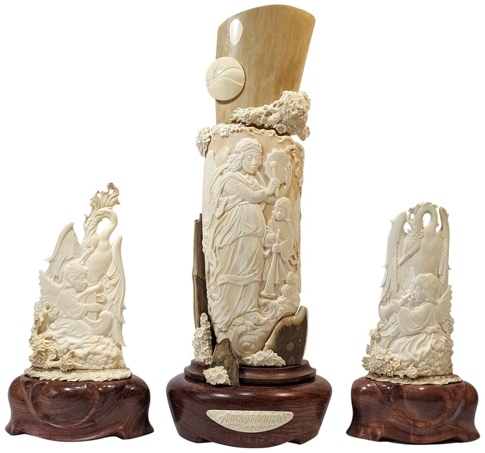The composition of the mammoth tusk "Angels and the bird of Happiness"