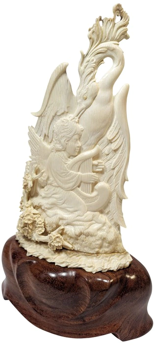 The composition of the mammoth tusk "Angels and the bird of Happiness"
