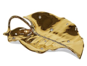 A dish in the shape of a leaf