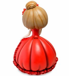 The piggy bank is a big "Girl in a red dress"
