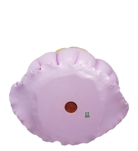 The piggy bank is a big "Girl in a purple dress"