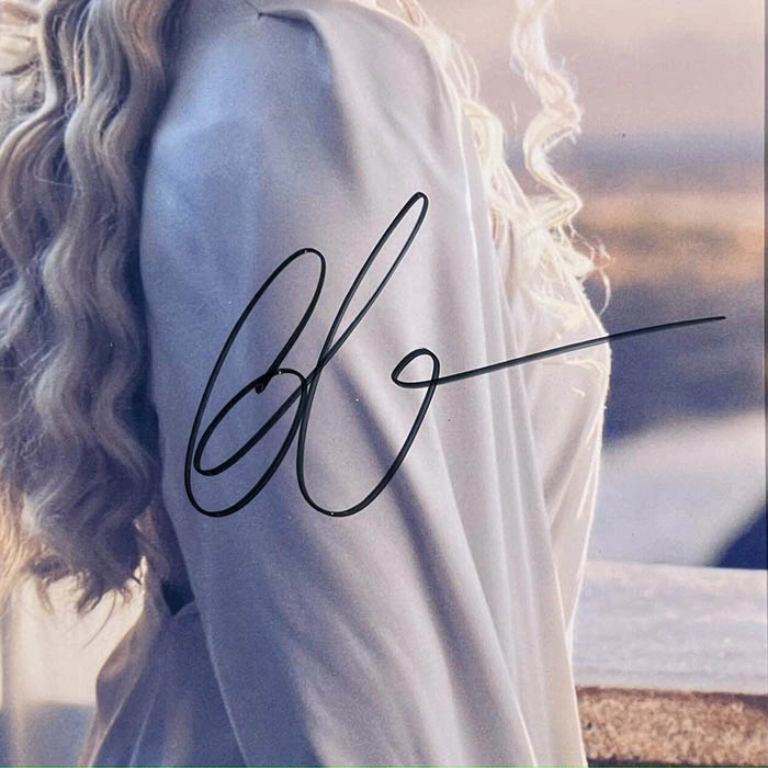 An autographed photo of actress Emilia Clarke