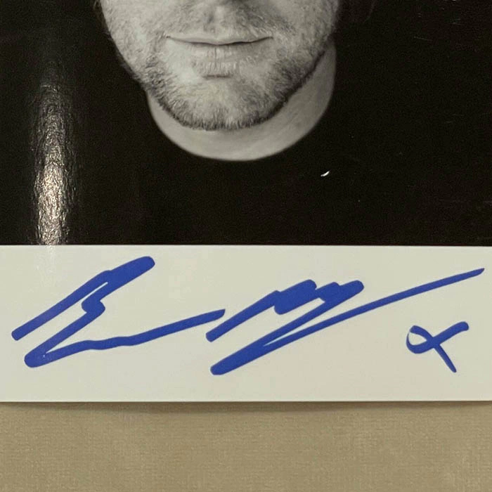 An autographed photo. Ewan McGregor