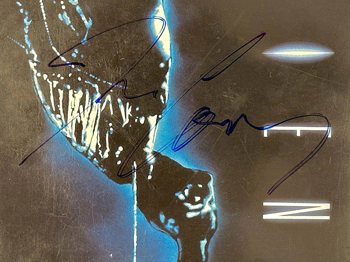 The DVD "Strangers" with an autograph. James Cameron
