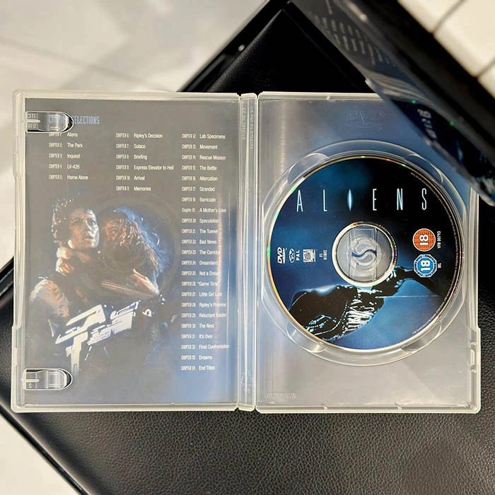 The DVD "Strangers" with an autograph. James Cameron
