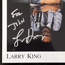 An autographed photo. Larry King