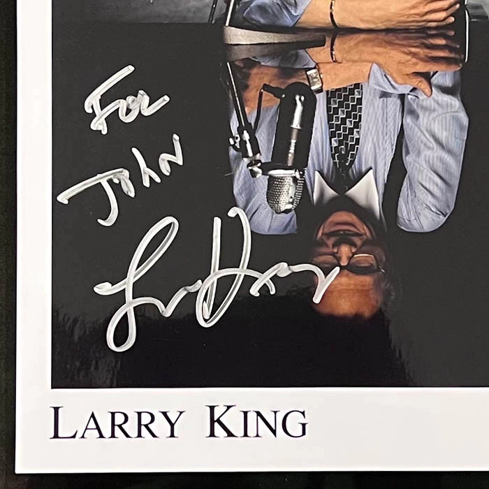 An autographed photo. Larry King