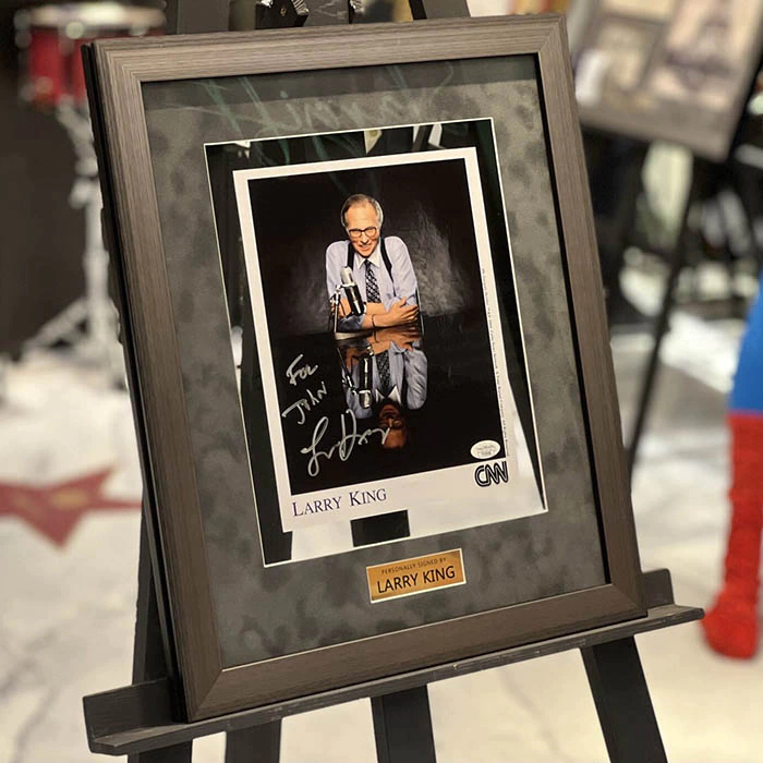 An autographed photo. Larry King