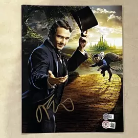 An autographed photo. A shot from the movie "Oz: The Great and Terrible" by James Franco