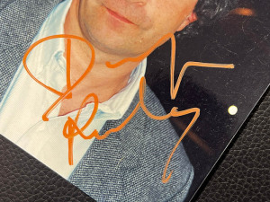 An autographed photo. Dominique Rocheau