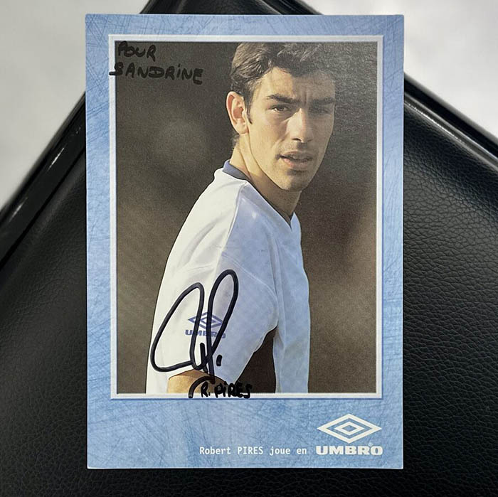 An autographed photo. Robert Pires