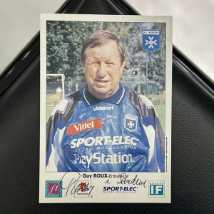 An autographed photo. Guy Ru
