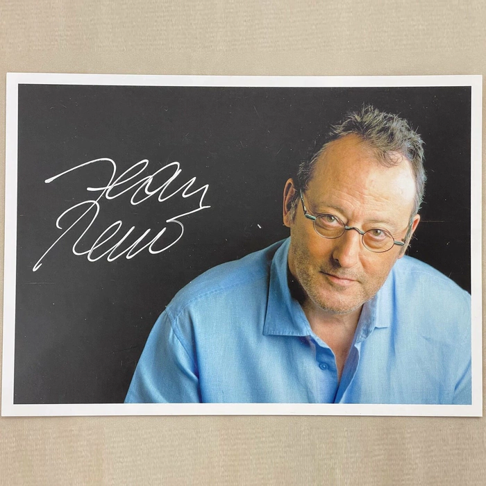 An autographed photo. Jean Renaud