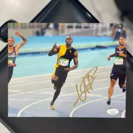 Фото с автографом Усейна Болта