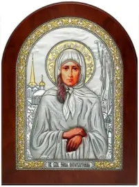 Икона "Святая Ксения Петербургская" коричневая Икона "Святая Ксения Петербургская" коричневая