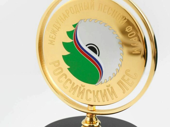 A medal spinning on a stand