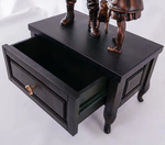 Statuette of beech "Polite people" on the bedside table