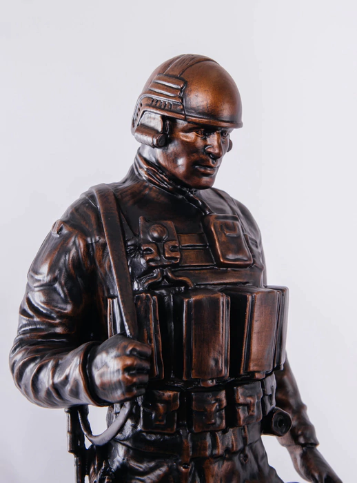 Statuette of beech "Polite people" on the bedside table