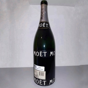 A bottle of Moet used by racer Ayrton Senna during the award ceremony at the Monaco GP with an autograph, 1993