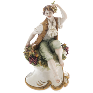 Statuette "Young man with fruits"