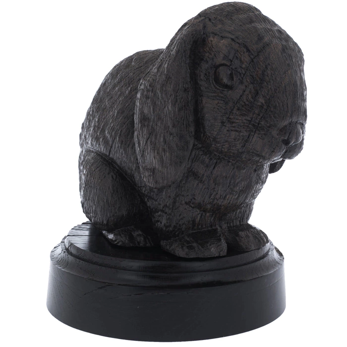 A figurine of stained oak "Rabbit" on a stand