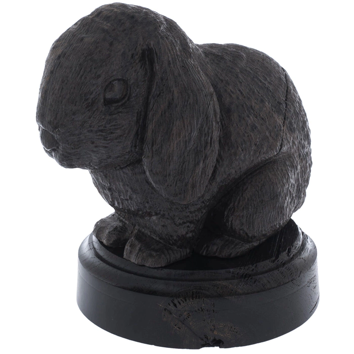 A figurine of stained oak "Rabbit" on a stand