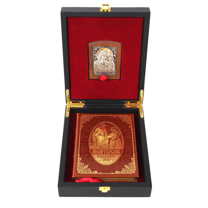 A leather-bound book "Prayer Book of an Orthodox Cossack" with an icon of the "Kazan Mother of God"