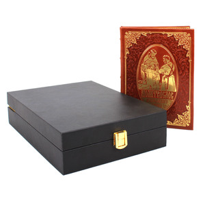 A leather-bound book "Prayer Book of an Orthodox Cossack" with an icon of the "Kazan Mother of God"