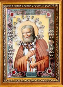 The icon with precious stones "St. Seraphim of Sarov" with pearls is gilded small